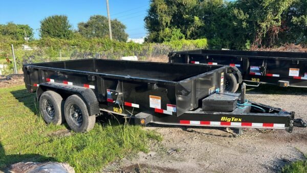 377116312_3599058953754639_6692128401868626353_n-600x338-1-1.jpg 14 Foot Big Tex Low Profile with Spreader Gate Black Dump Trailer (14LD-14BK) - Image 1