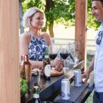 Backyard Discovery Cedar Springs Cedar Wood Outdoor Bar Set with Steel Countertops Shelving and TV Mount Privacy Wall - Image 8